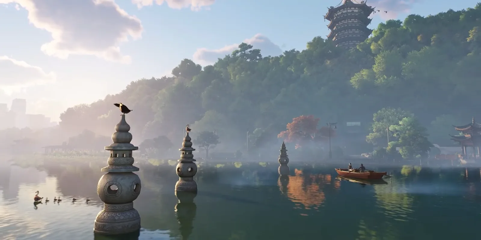 Ananta Chongxiao lake with three small stone pagodas standing in the water, a rowing boat and a tall pagoda on the wooded hill behind
